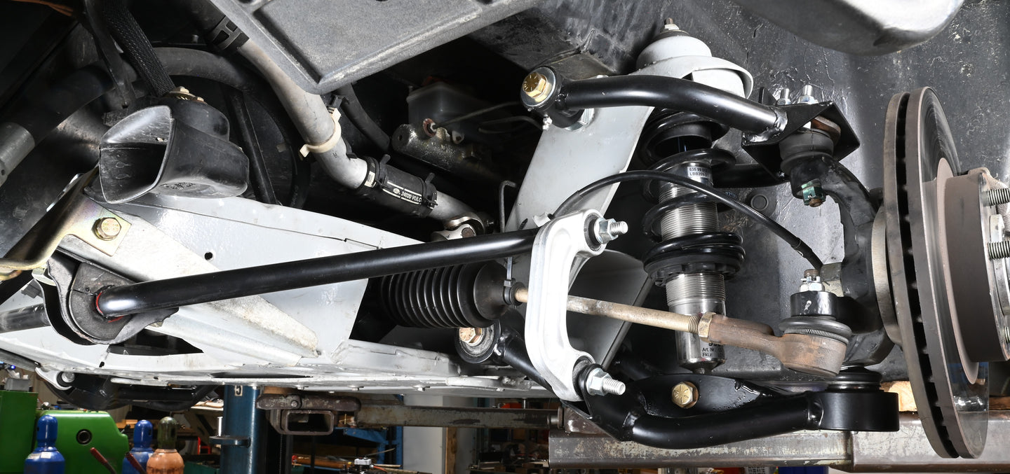 DeLorean tubular lower control arm assembly showcasing upgraded suspension components.