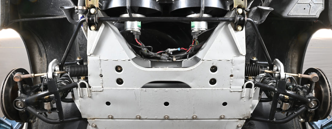DeLorean tubular lower control arm assembly showcasing the SICArm LCA upgrade for enhanced vehicle performance.